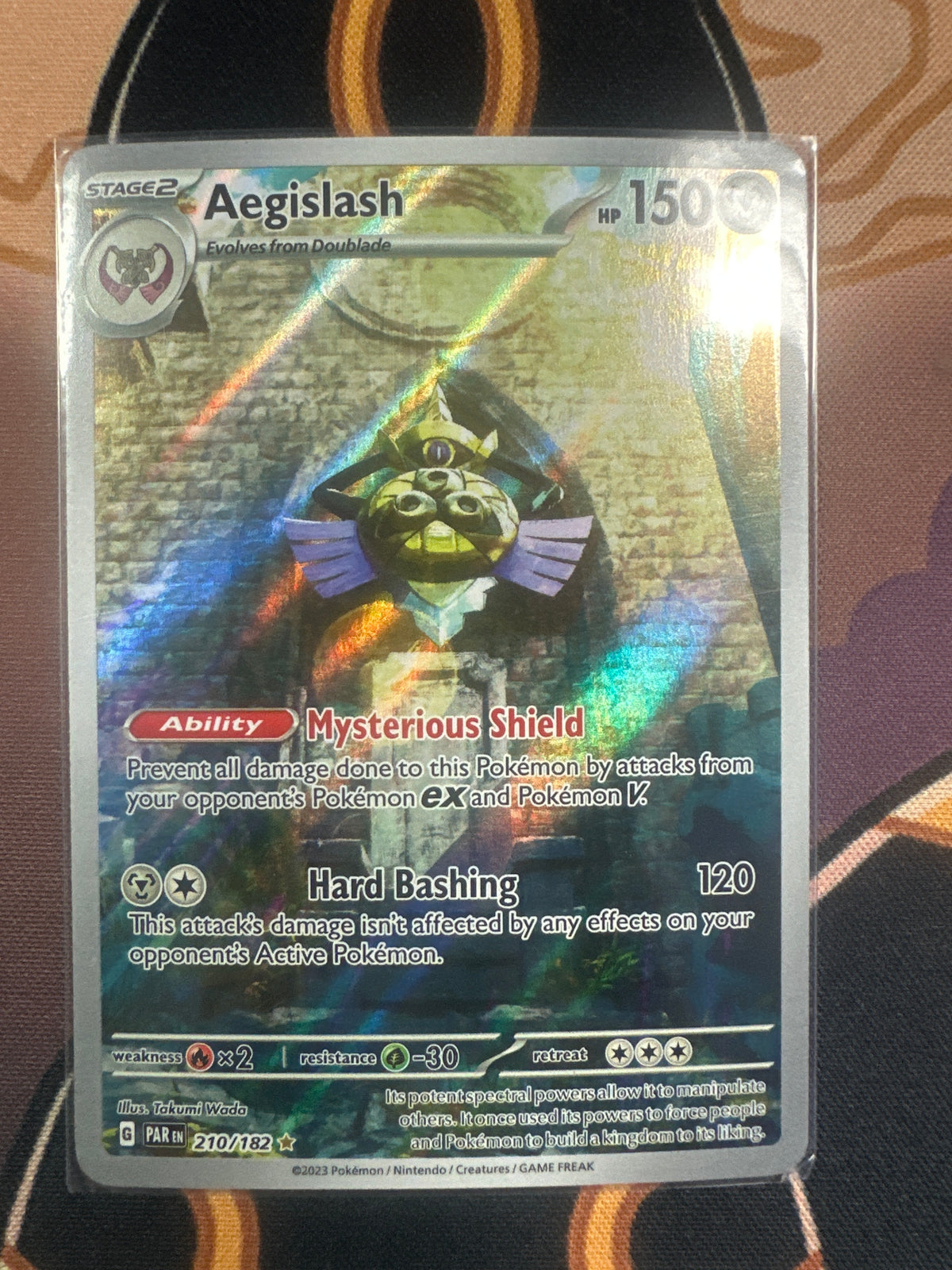 Aegislash 210/182 • Paradox Rift | Pokémon
