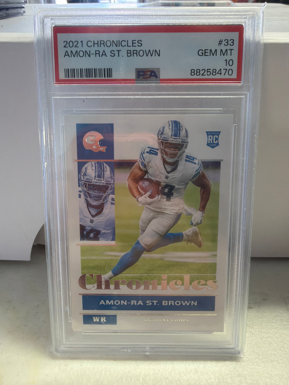 PSA 10 | 2021 Panini Chronicles - Amon-Ra St. Brown #33 (RC)