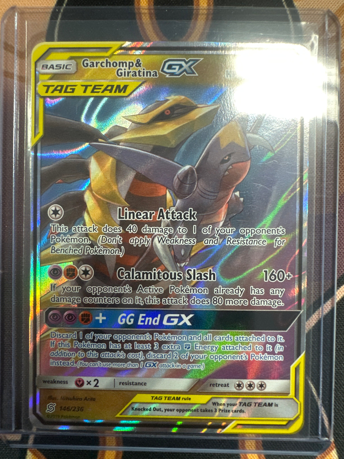 Tag Team Garchomp & Giratina GX 146/236 • Unified Minds | Pokémon